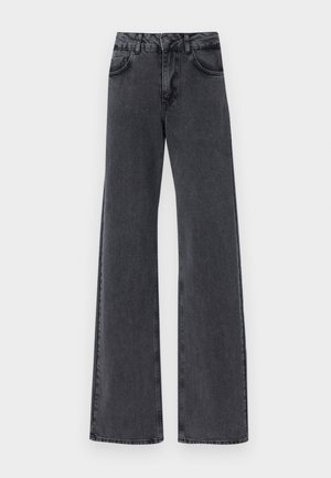 Sorte denim flared jeans med høy midje, med to forsidelommer og subtile sømdetaljer langs sømmene.