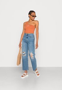 Levi's® GRAPHIC POOL TANK - Top - 90s seasonal logo autumn leaf