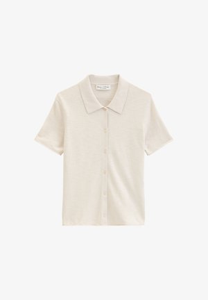 Camicia beige a maniche corte con bottoni e colletto appuntito, realizzata in tessuto leggero, mostrata su sfondo bianco.