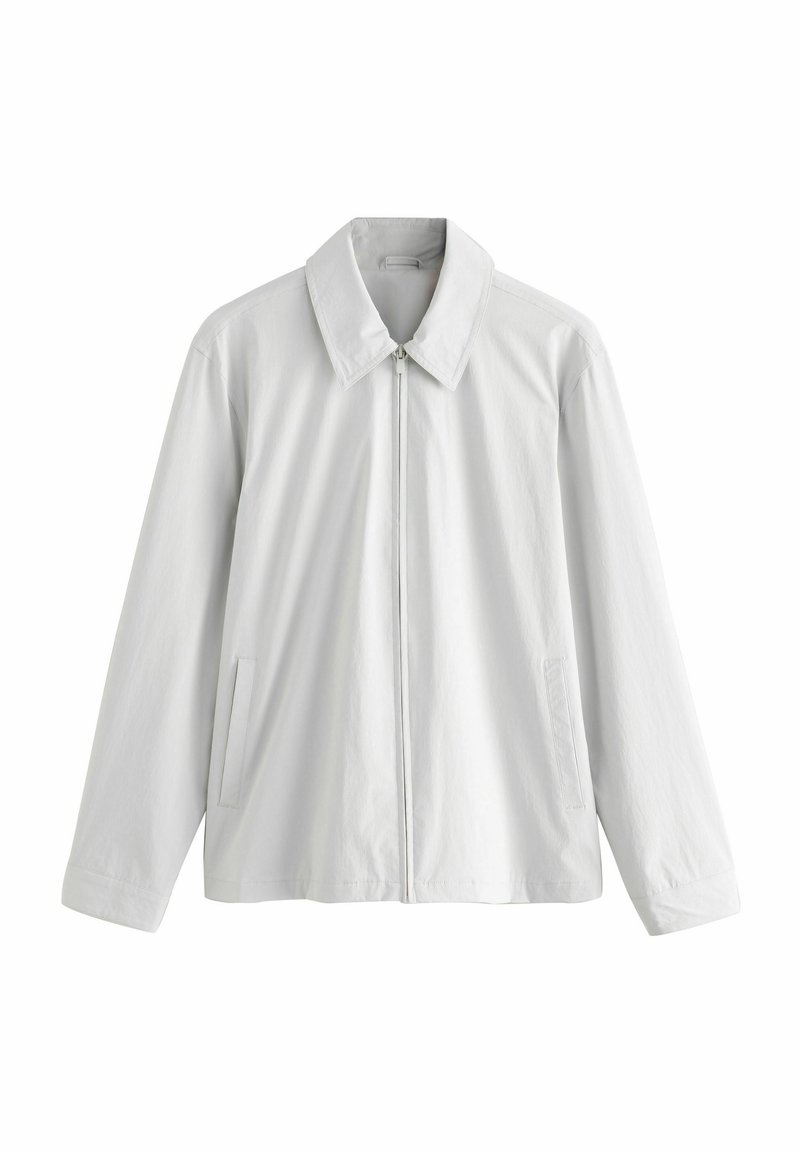 Lichtgrijs vest met ritssluiting, puntige kraag, lange mouwen en zijzakken. Glad, lichtgewicht materiaal met een minimalistisch ontwerp.