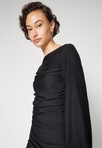 Gestuz RIFA DRESS - Φόρεμα από ζέρσεϊ - black