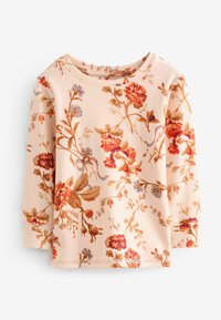 Camisa de manga larga hecha de tela suave, con un fondo en melocotón claro y un patrón floral en tonos rojos, naranjas y morados.