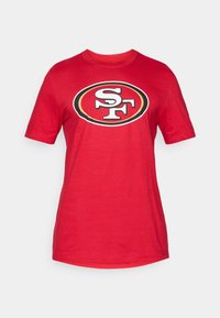 Red cotton t-shirt featuring a large black and white "SF" logo within an oval outline. Short sleeves and a round neckline.