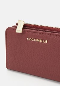 Coccinelle Wallet - bordeaux