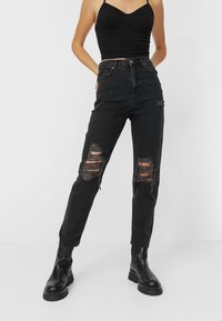 Stradivarius Vaqueros slim fit - black