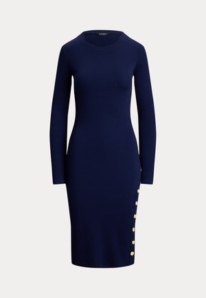 Robe bleu marine à manches longues avec un col rond, coupe slim, et des boutons dorés le long du côté gauche. Fabriquée en tissu lisse et extensible.