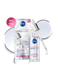Clear glass serum bottle with a dropper, silver cap, and white bulb. Packaging features geometric design, blue and pink text, and a round sticker.