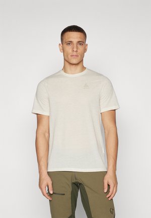 Light beige short-sleeve t-shirt made from a textured material, featuring a round neckline and a small logo on the left chest area.