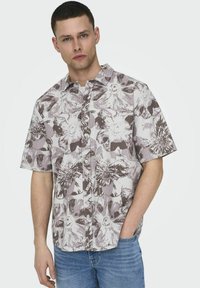 Kurzärmeliges Hemd mit Knopfleiste und floralem Muster in Grautönen und Beige, aus strukturiertem Stoff und mit klassischem Kragen.