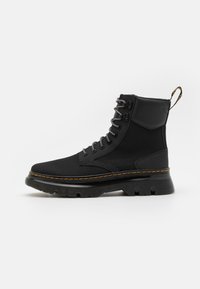 Dr. Martens Bottines à plateau - black