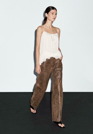 Rank 3: Massimo Dutti - DISTRESSED NAPPA FINISH WITH WORN EFFECT - Leather trousers