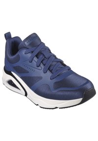 Scarpa sportiva blu navy con tomaia in rete, suola in gomma e dettagli testurizzati. Presenta lacci piatti e un elemento di ammortizzazione ad aria visibile.