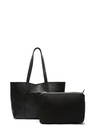 Black leather tote bag with textured finish and two handles, accompanied by a small black zippered pouch made of smooth fabric.