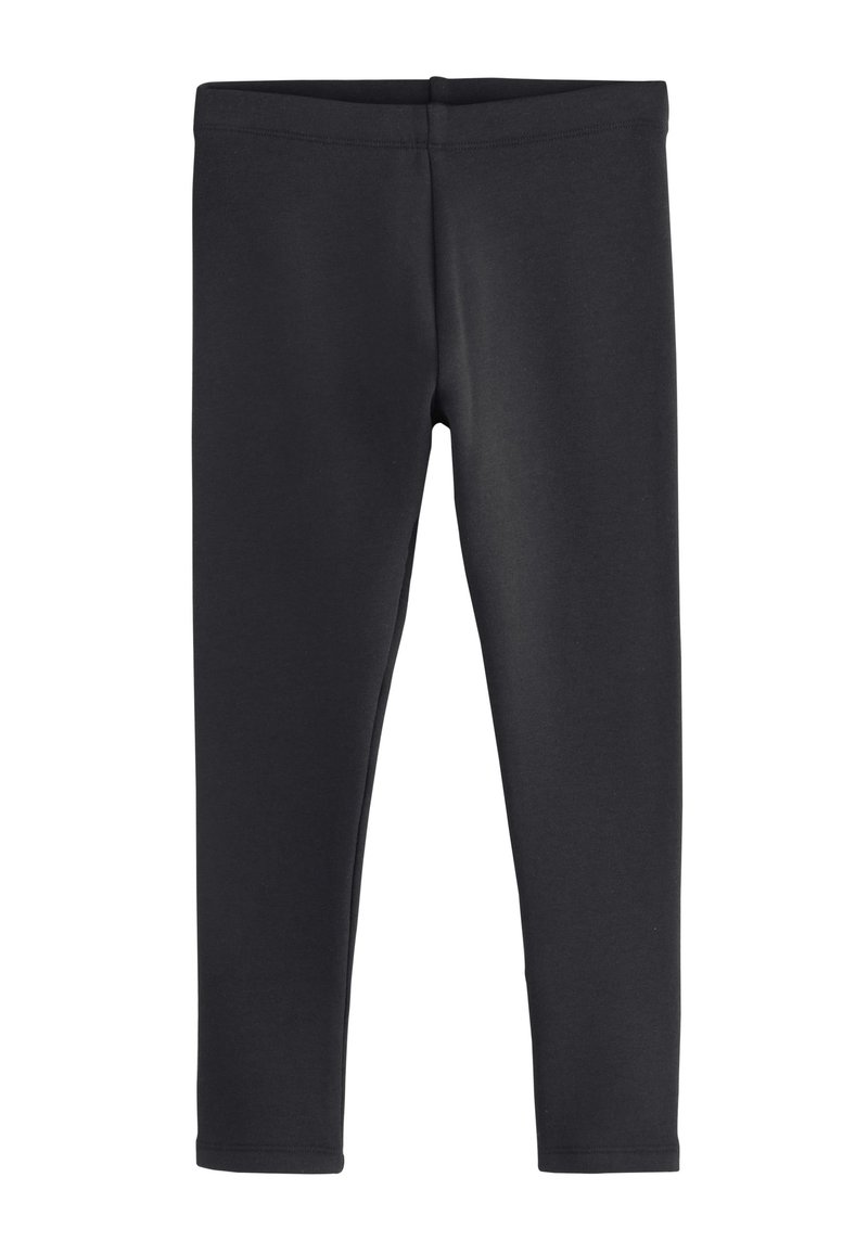 Leggings nere realizzati in un tessuto misto cotone elastico, caratterizzati da una texture liscia e una vita elastica per garantire comfort. Cuciture non visibili.