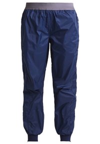 Navyblaue leichte Hose mit einem elastischen grauen Bund, elastischen Bündchen an den Knöcheln und einer glatten, wasserabweisenden Textur.
