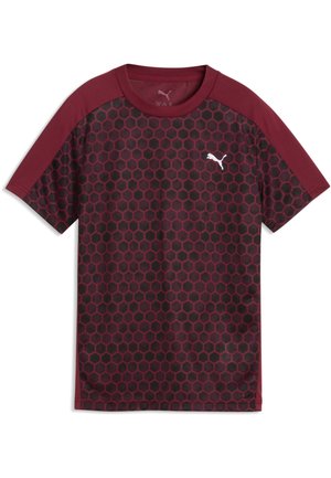 Korteærmet bordeauxrød skjorte med sekskantet mønster, ensfarvede bordeaux skuldre og et lille hvidt Puma-logo på brystet.