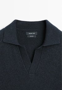 Dark navy cotton sweater with a textured knit, featuring a V-neck and a classic collar. Label reads “Massimo Dutti, 100% cotton, made in China.”