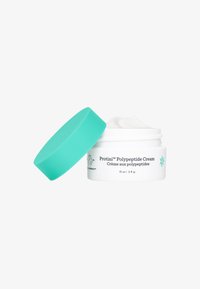 White jar with turquoise lid, containing thick cream. Label reads "Protini™ Polypeptide Cream," with 15 ml / 0.5 fl oz capacity indicated.