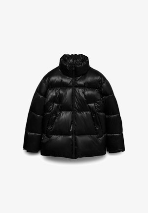 Black puffer jacket with a high collar, zip closure, and large quilted panels. Features two side pockets and a glossy finish.