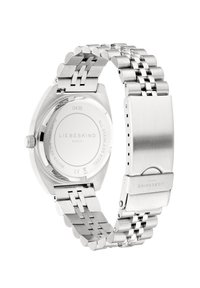 RVS-horloge met een slank ontwerp, hexagonale kast, metalen schakelsluiting en een minimalistische wijzerplaat met een merkgravure.