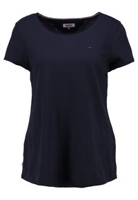 Tmavomodré krátkos sleeves dámské tričko s kulatým výstřihem, malé logo Tommy Hilfiger na hrudi a štítek uvnitř límce označený velikostí S.