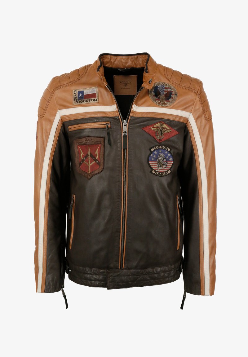 Brown leather motorcycle jacket with tan accents, multiple patches, zip front, and quilted shoulder detail. Features two side pockets.
