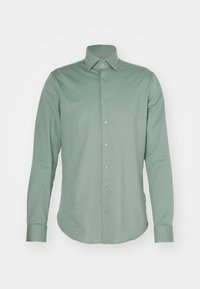 SOLID SLIM SHIRT - Cămașă - dark forest