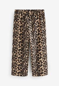 Pantalons en imprimé léopard dans des teintes beige et noire avec une taille élastique. Le tissu présente une texture côtelée, mettant en valeur un motif animal audacieux.