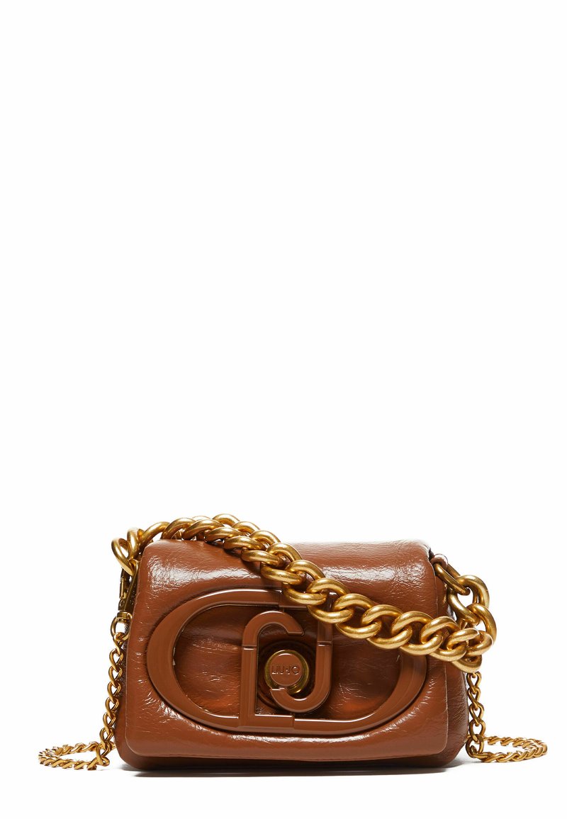 Brown leather handbag featuring a smooth texture, chunky gold chain strap, and a prominent embossed logo detail on the front.