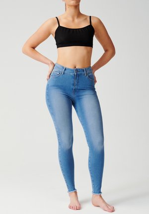 SLIM HIGH RISE POWER SHAPING DENIM - Jeans Skinny Fit - faded blue