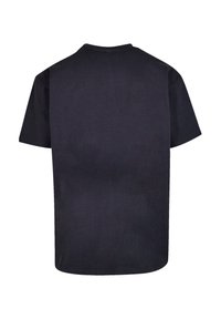 Black cotton t-shirt with short sleeves and a crew neck. Smooth texture, relaxed fit, and no visible logos or patterns.
