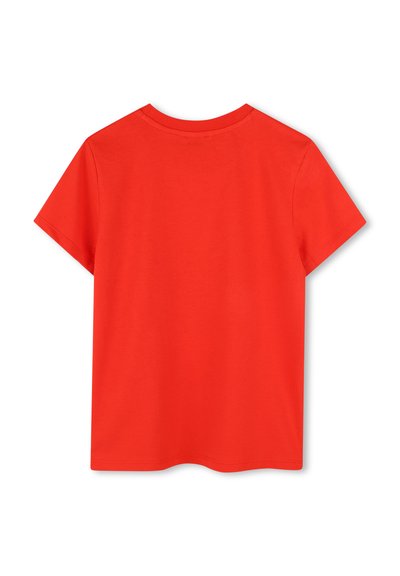 T-shirt à manches courtes, col rond, en coton rouge vif, présentant une texture lisse et un design simple et sans embellissement.