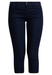 Vaqueros skinny cortos de color azul oscuro con cierre frontal de botón y cremallera, y diseño de cinco bolsillos.