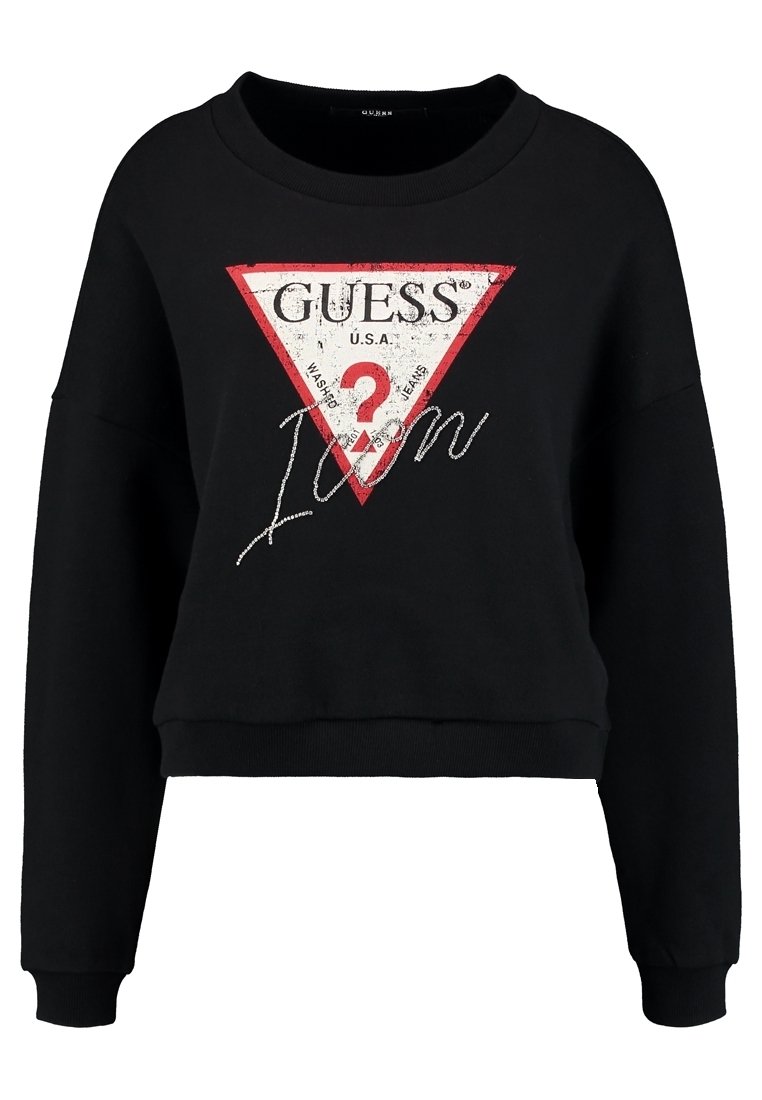 Sweat-shirt court noir à manches longues avec un logo triangulaire rouge et blanc affichant "GUESS U.S.A." et "Icon" en écriture manuscrite sur le devant.
