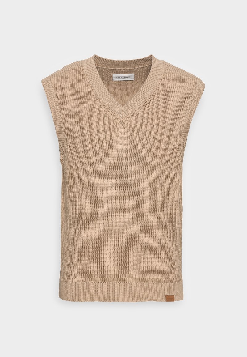 Gilet sans manches en tricot beige avec encolure en V et ourlet côtelé, présenté sur un fond clair uni.