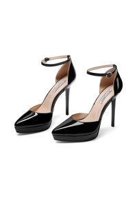 Décolleté in vernice nera con punte affusolate, cinturini alla caviglia e base piattaforma. Presentano una finitura lucida e tacchi a stiletto sottili.