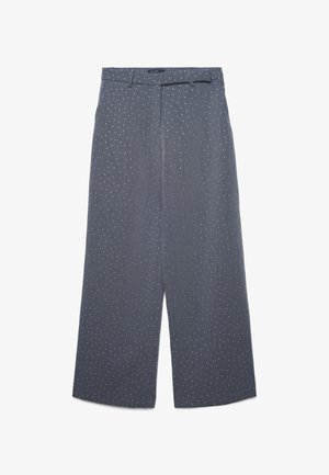 Wide-leg trousers in dark gray fabric with a subtle pinstripe pattern and white polka dots, featuring a belt loop waistband and tailored design.