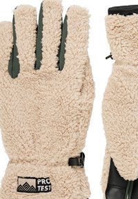 Bežiniai pūkuoti pirštinės su tekstūruotu audiniu, žaliais odiniais akcentais ant pirštų ir reguliuojamu riešo dirželiu, turinčios logotipo pleistrą.