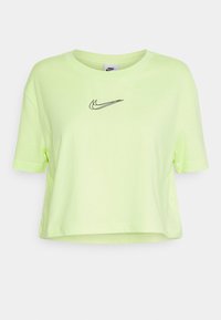 Limegrön kort t-shirt i bomull, med en svart Nike-logga på bröstet, korta ärmar och rundad halsringning.