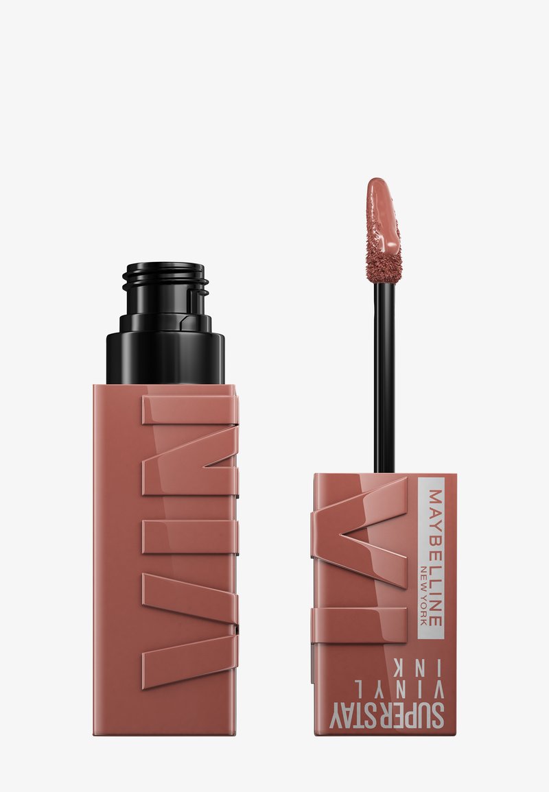 Maybelline Superstay Vinyl Ink läppfärg i en matt rosafärgad förpackning med en svart applikator. Glansig textur, slank rektangulär form med logotypdetalj.