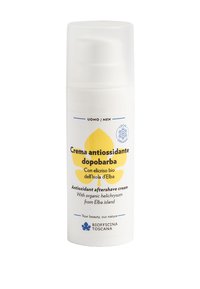 Bottiglia di plastica bianca con erogatore a pompa, etichettata in blu e giallo. Il testo include "Crema dopobarba antiossidante" con dettagli su elichiriso organico.
