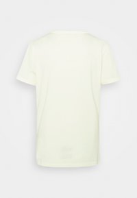 T-shirt a maniche corte di colore giallo pallido, colletto tondo, in cotone, taglio dritto, senza motivi o design, vista posteriore pulita.
