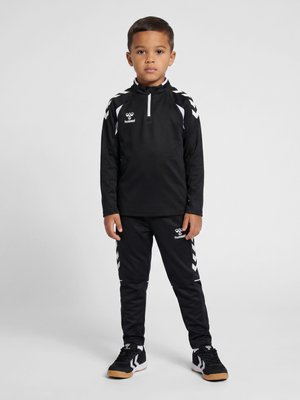 Hummel, CORE 2.0 TRAINING - Tracksuit bottoms - black white