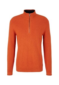 Pull-over orange avec un col haut, doté d'une fermeture éclair devant. Texture côtelée, manches longues et design uni.