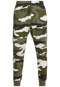 Herr joggerbyxor i camouflagemönster med elastisk midja och neddragna anklar, med en liten Nike-logga på högra låret.