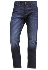 Dunkelblaue Slim-Fit-Jeans aus Denim mit leichter Verfärbung an den Oberschenkeln, vorderen Taschen, Gürtelschlaufen und Knopfverschluss.