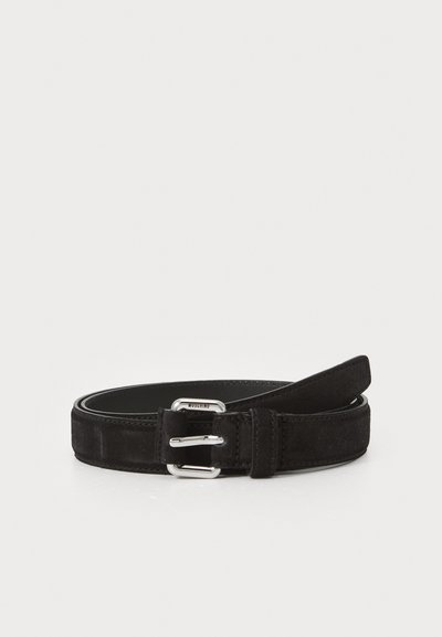 Black suede belt with a silver metal buckle, featuring a smooth finish and a single-prong design. Adjustable length with stitched edges.