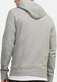 Grauer Hoodie aus weichem Stoff, mit Kordelzugkapuze, langen Ärmeln sowie gerippten Bündchen und Saum. Schlichte, einfarbige Gestaltung.
