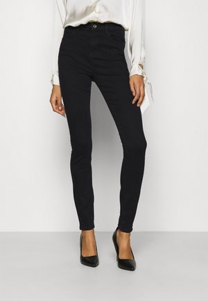Vaqueros pitillo - black denim