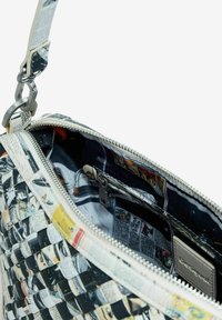 Desigual Handbag - material finishes